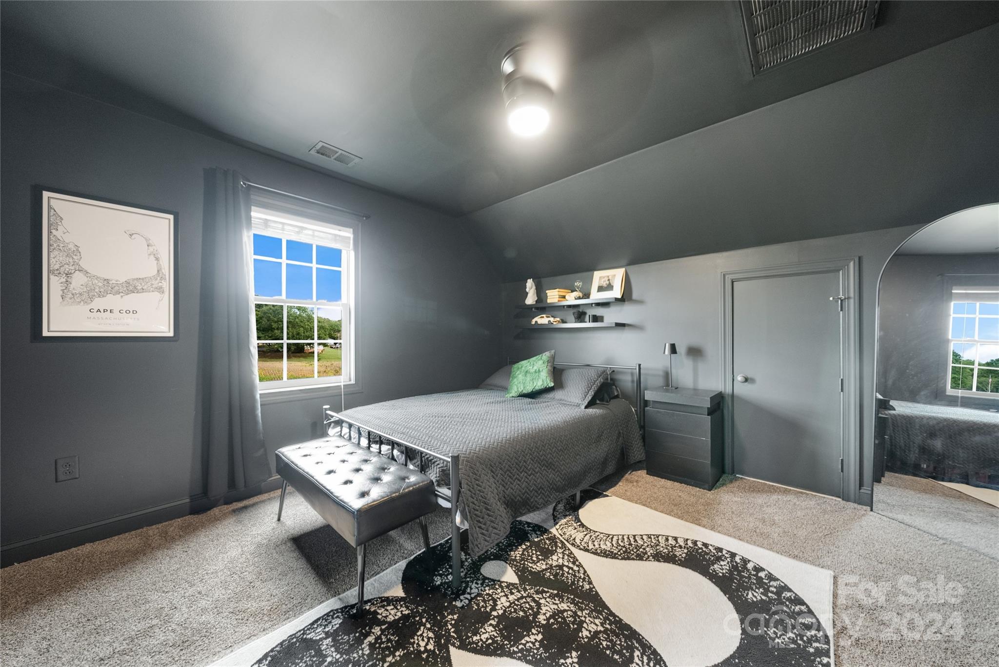 7400 Carl Polk Road Monroe, NC 28110 - Photo 29 of 48 a bedroom with bed and a window