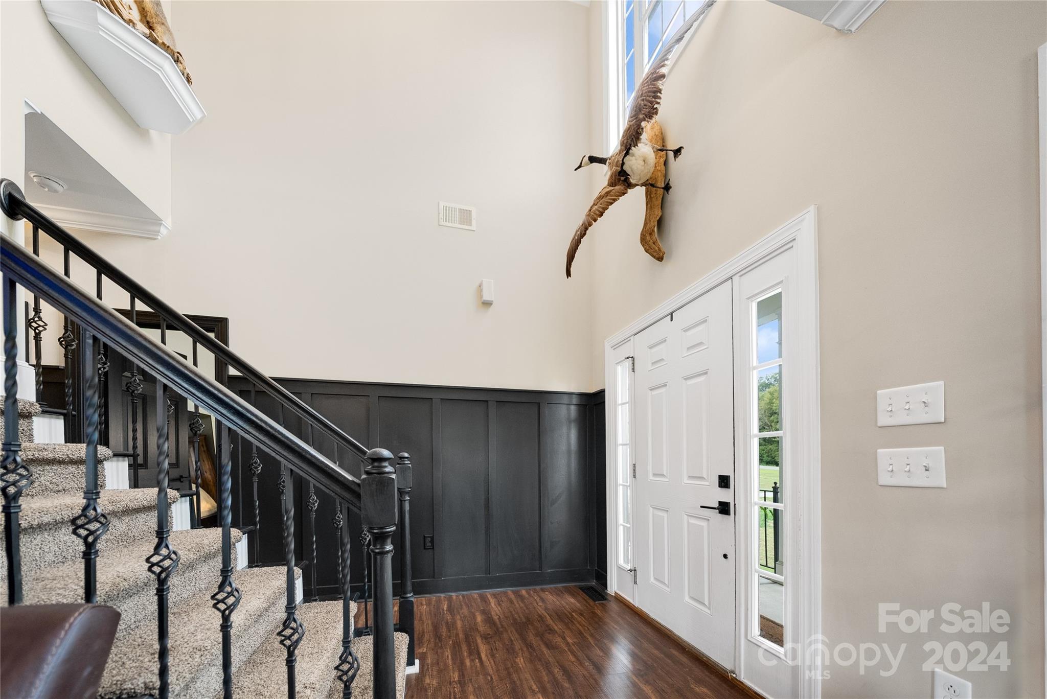 7400 Carl Polk Road Monroe, NC 28110 - Photo 3 of 48 a view of entryway and hall with wooden floor