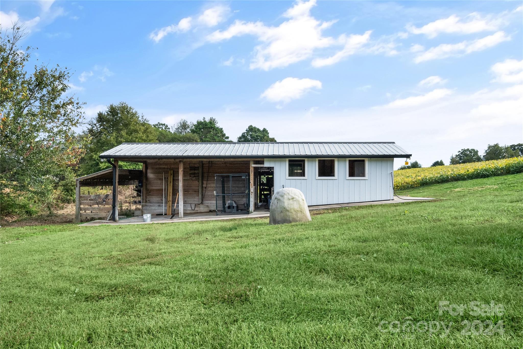 7400 Carl Polk Road Monroe, NC 28110 - Photo 41 of 48 a front view of house with yard and green space