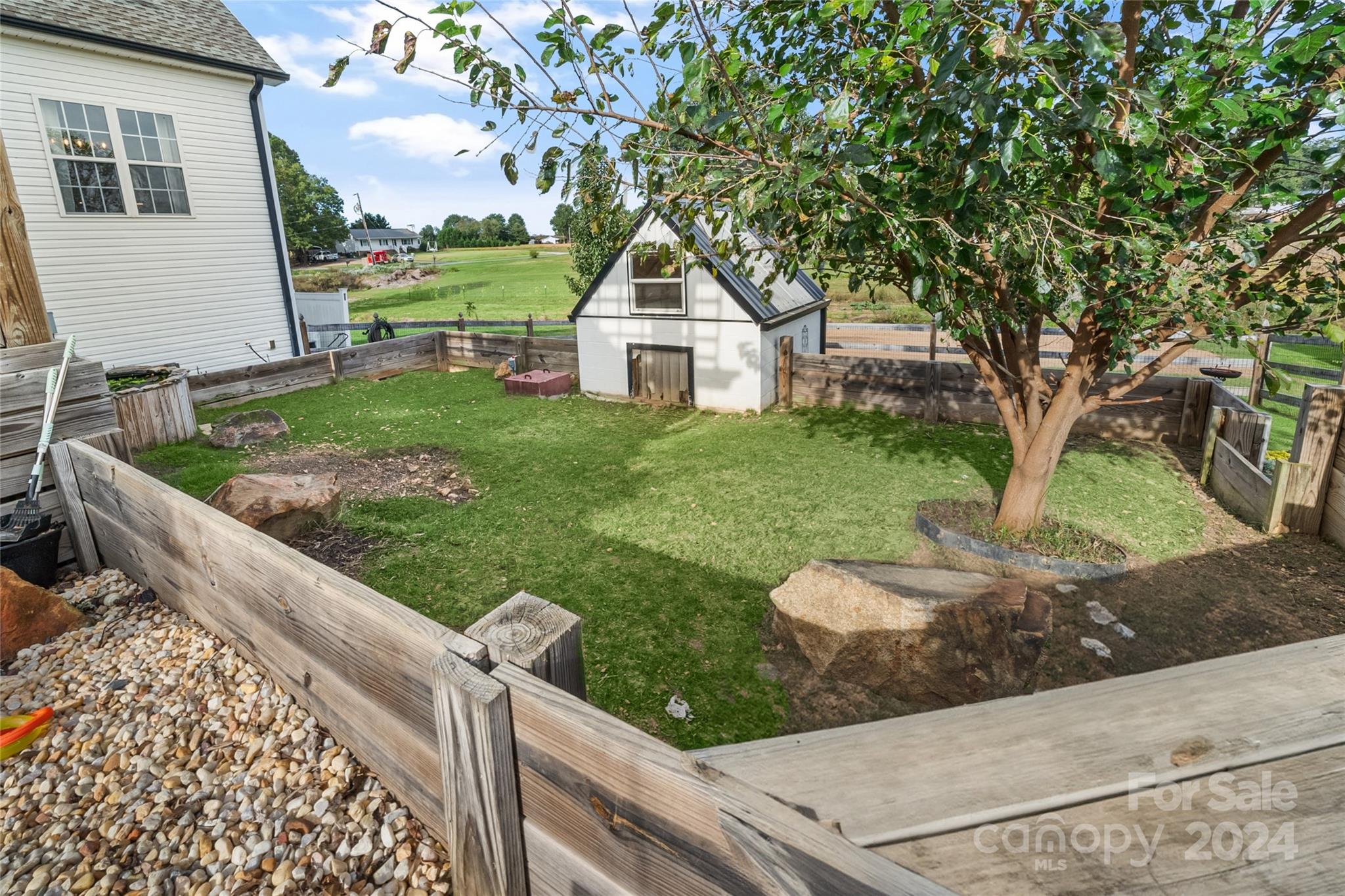 7400 Carl Polk Road Monroe, NC 28110 - Photo 42 of 48 a view of house with backyard and trees
