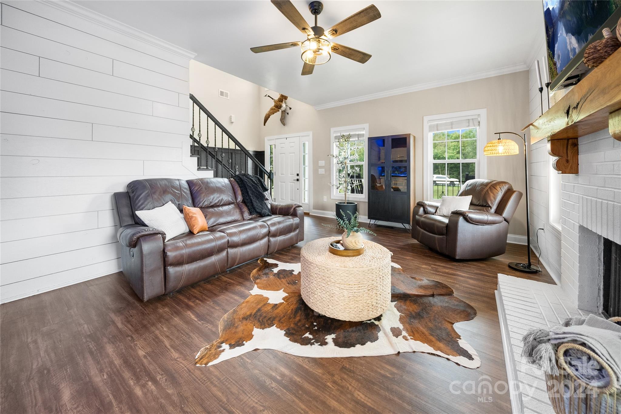7400 Carl Polk Road Monroe, NC 28110 - Photo 5 of 48 a living room with furniture and a flat screen tv