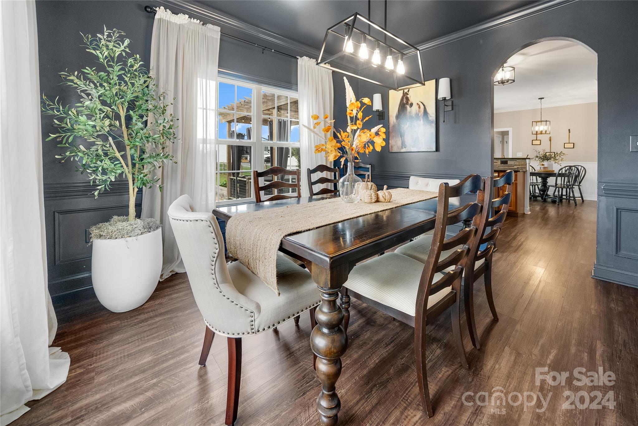 7400 Carl Polk Road Monroe, NC 28110 - Photo 8 of 48 a dining room with furniture and wooden floor
