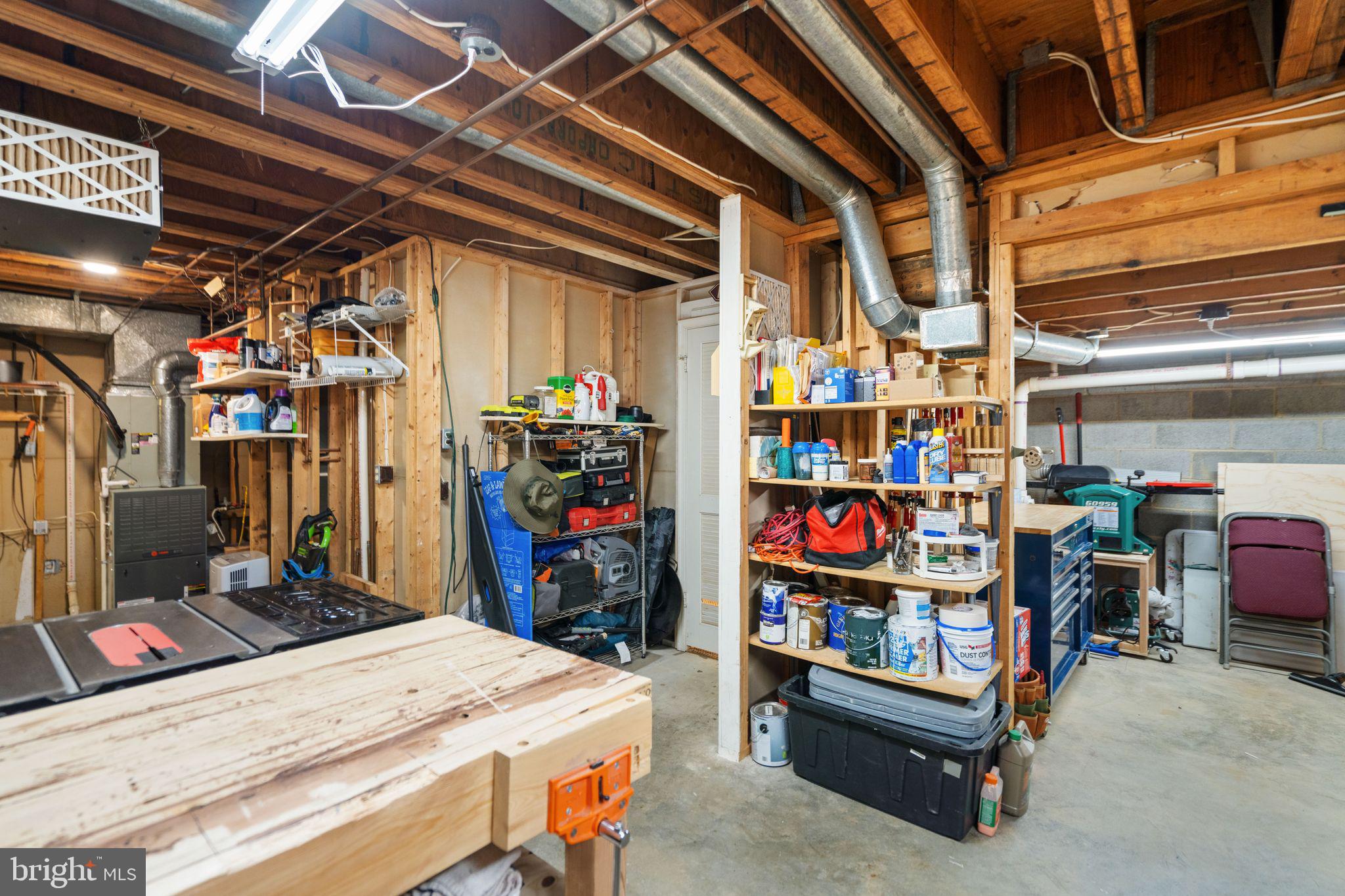 9012 Daum Court Springfield, VA 22153 - Photo 17 of 46 Spacious workshop with organized storage.