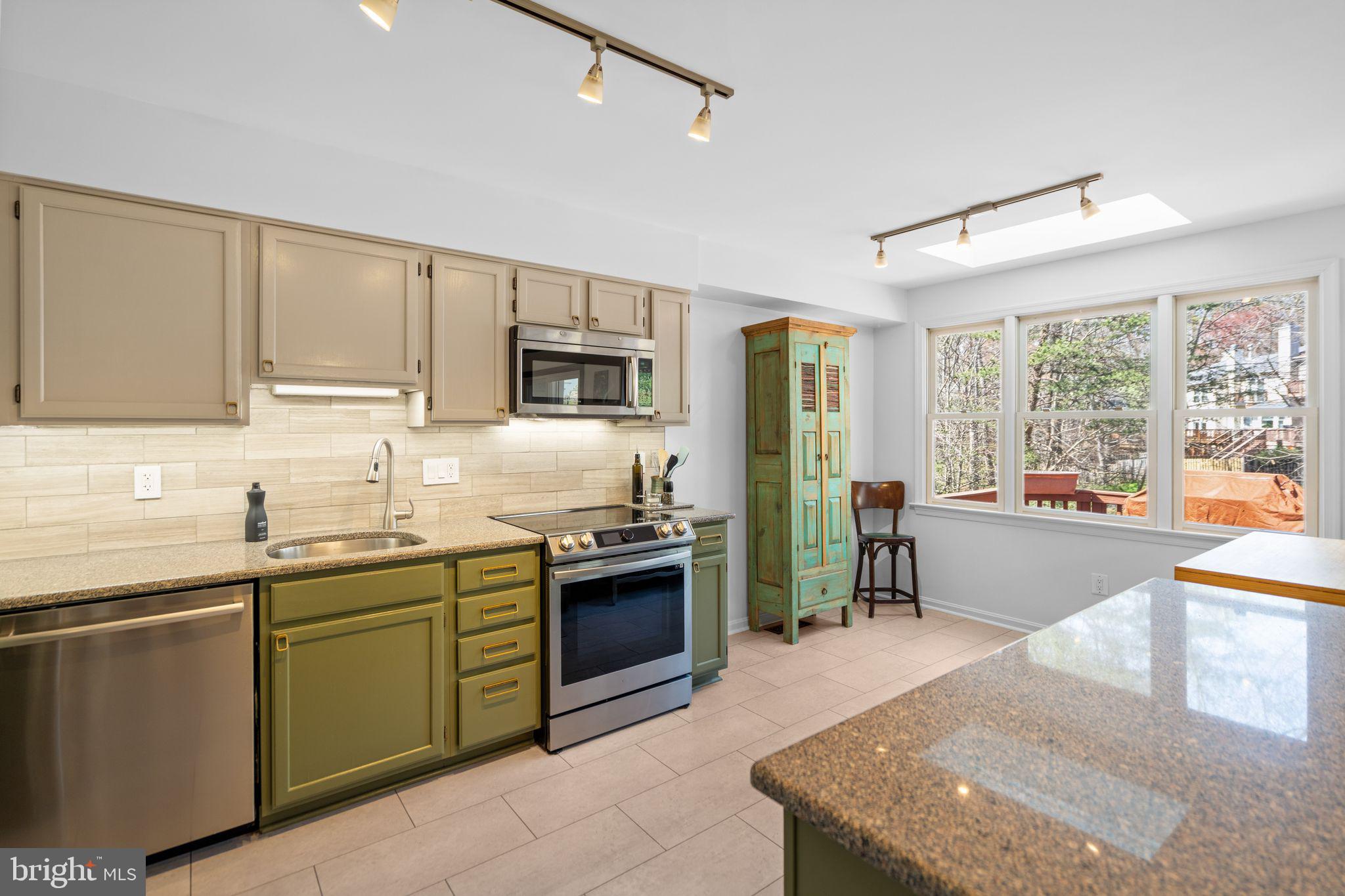 9012 Daum Court Springfield, VA 22153 - Photo 34 of 46 Charming kitchen with natural light.