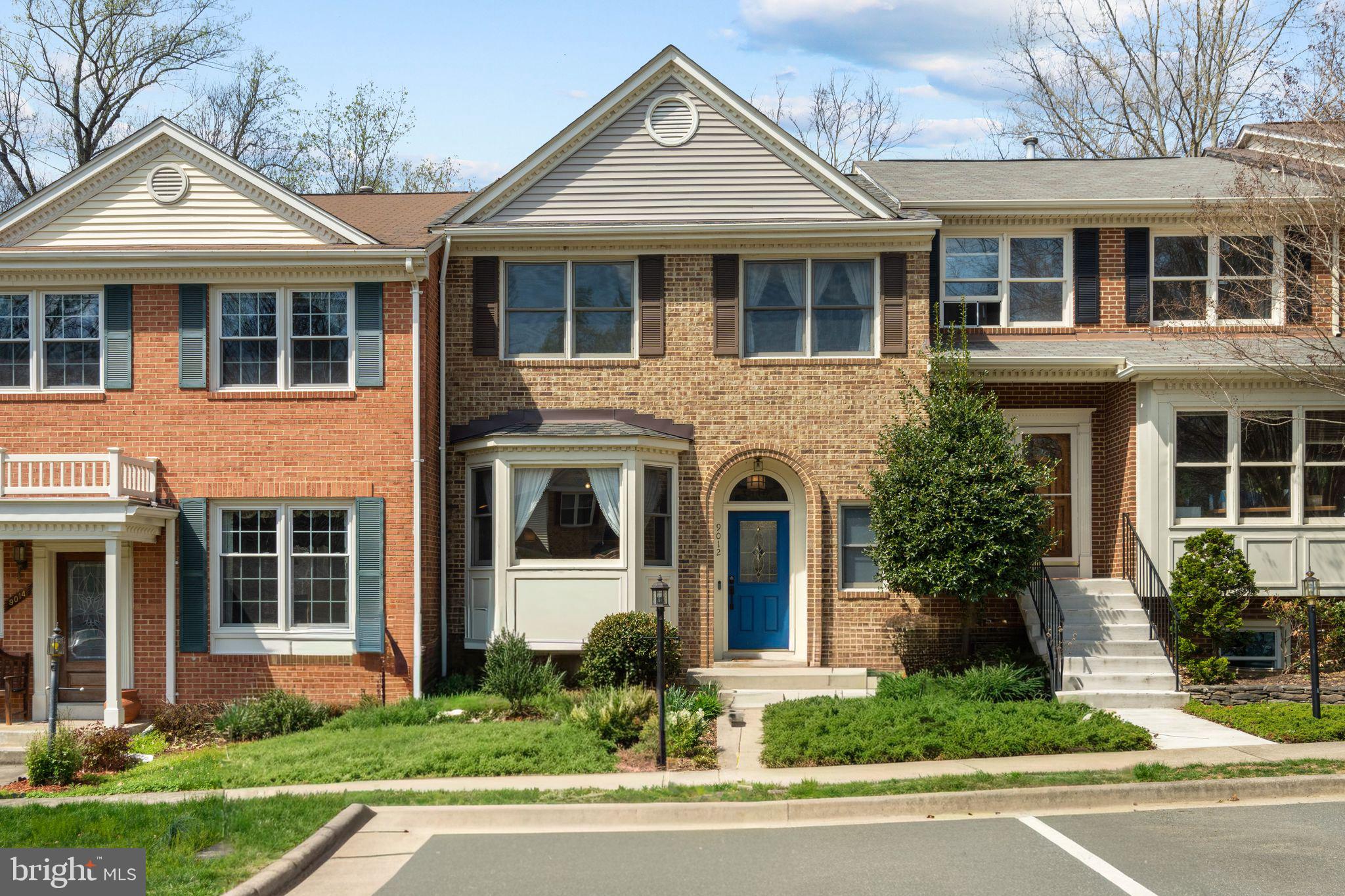 9012 Daum Court Springfield, VA 22153 - Photo 40 of 46 Charming brick townhouse with blue door.