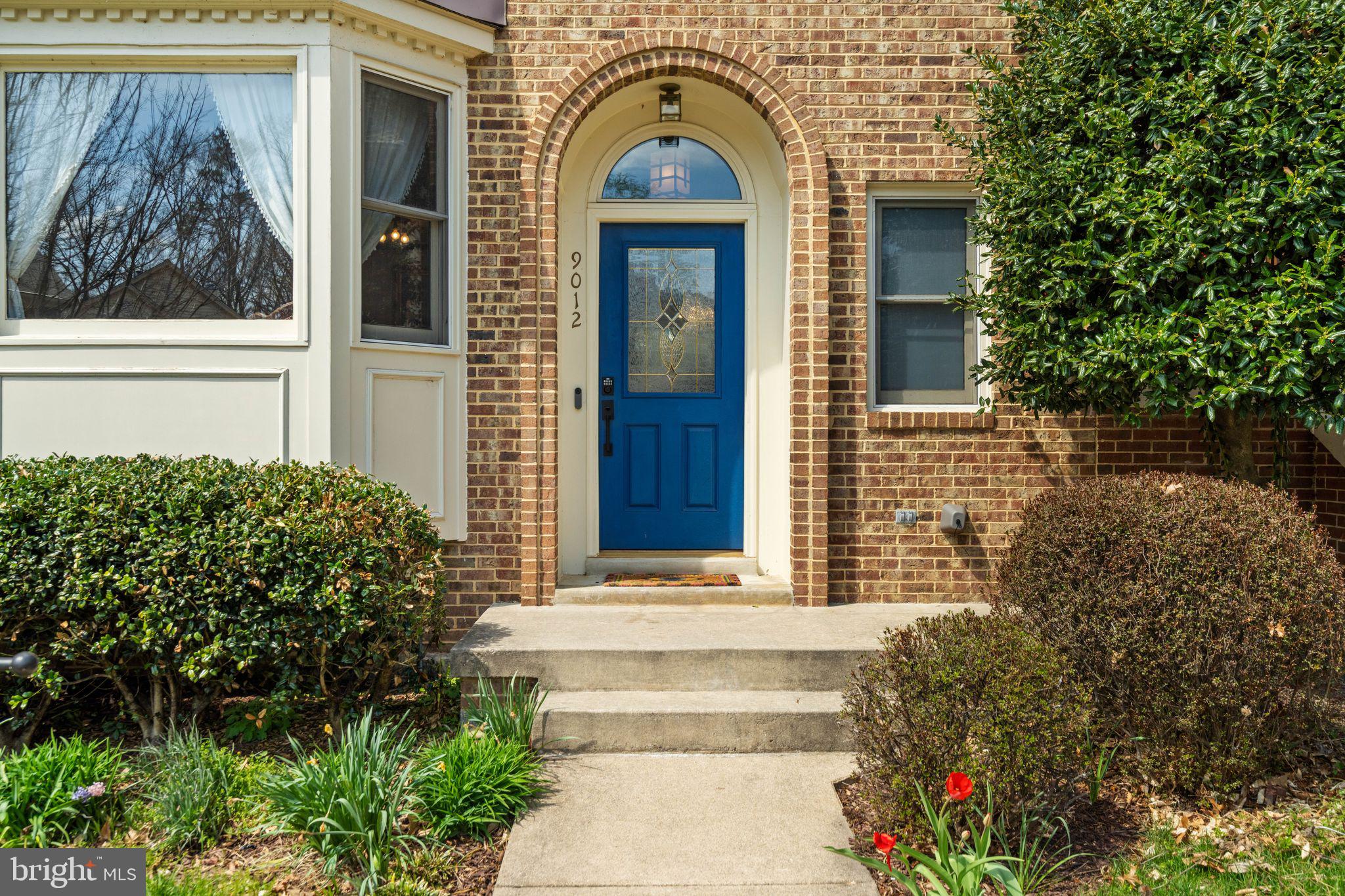 9012 Daum Court Springfield, VA 22153 - Photo 41 of 46 Charming entrance with vibrant blue door.