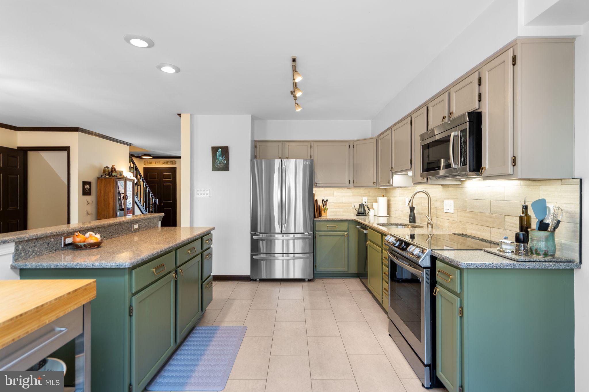 9012 Daum Court Springfield, VA 22153 - Photo 8 of 46 Modern kitchen with stylish finishes.