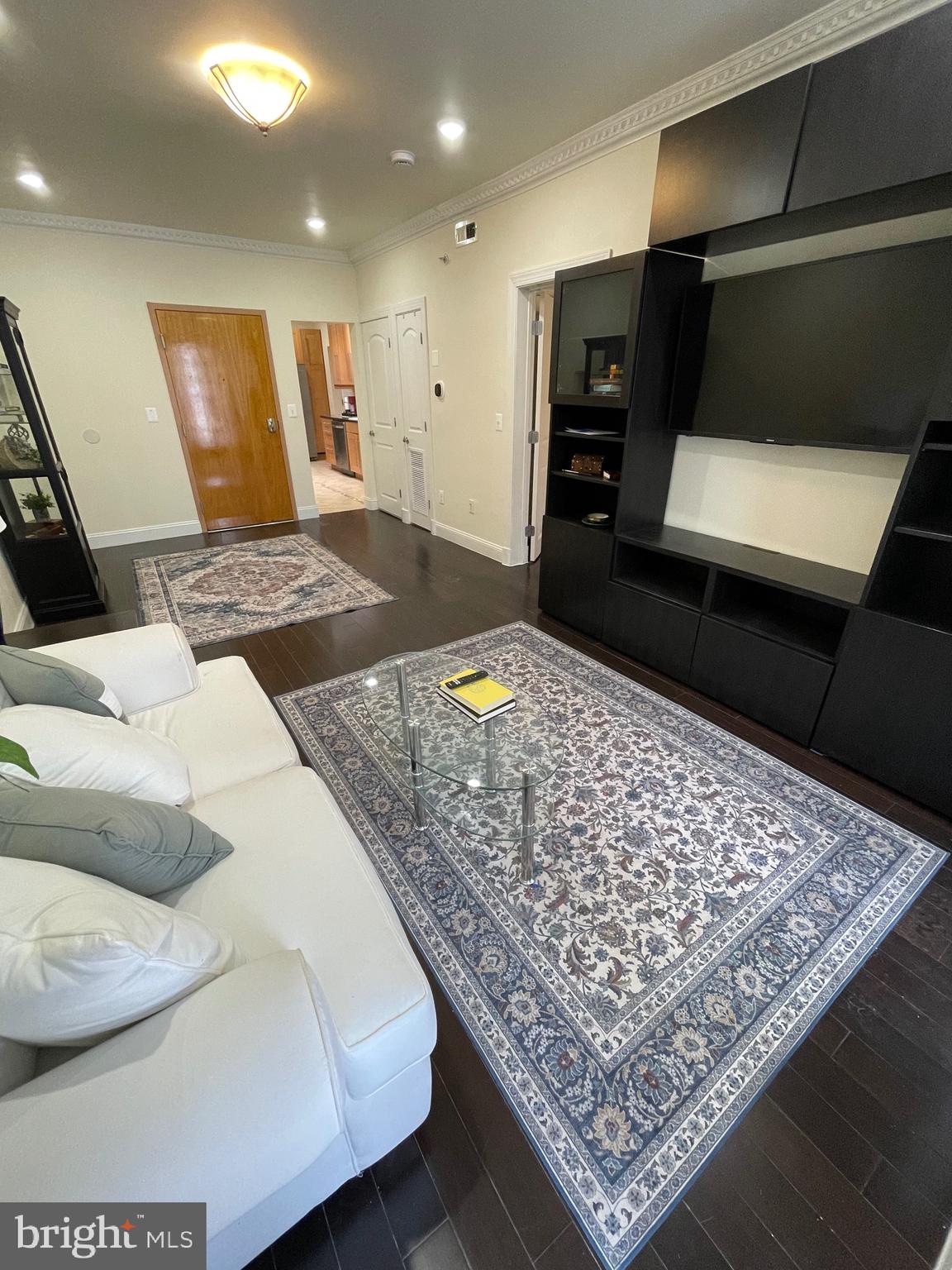 1929 16th Street Northwest, Unit 101 Washington, DC 20009 - Photo 4 of 29 Tenant has option to keep Entertainment Center