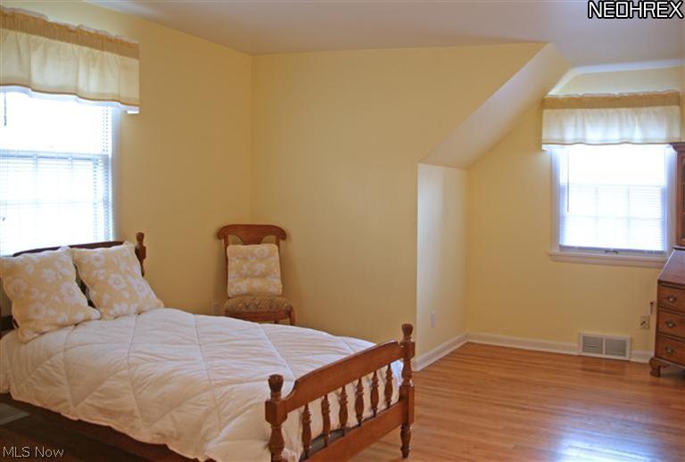 184 Overwood Road Akron, OH 44313 - Photo 17 of 24 Bedroom 3 - good size and again neutral, sunny and with hardwood floors.