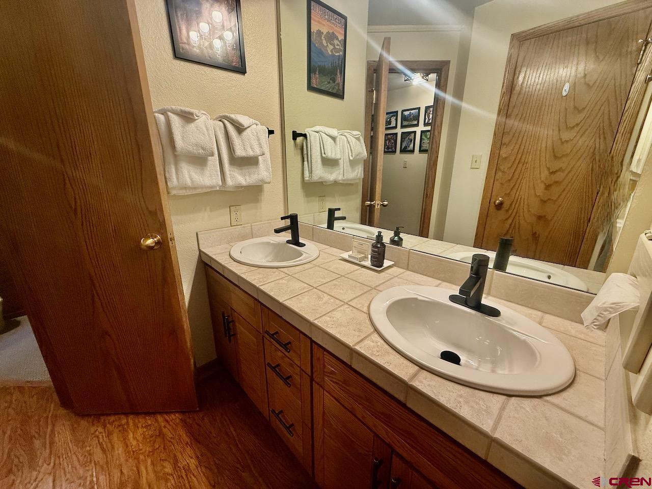 11 Snowmass Road, Unit 337 Crested Butte, CO 81225 - Photo 30 of 35 a bathroom with a sink and a mirror