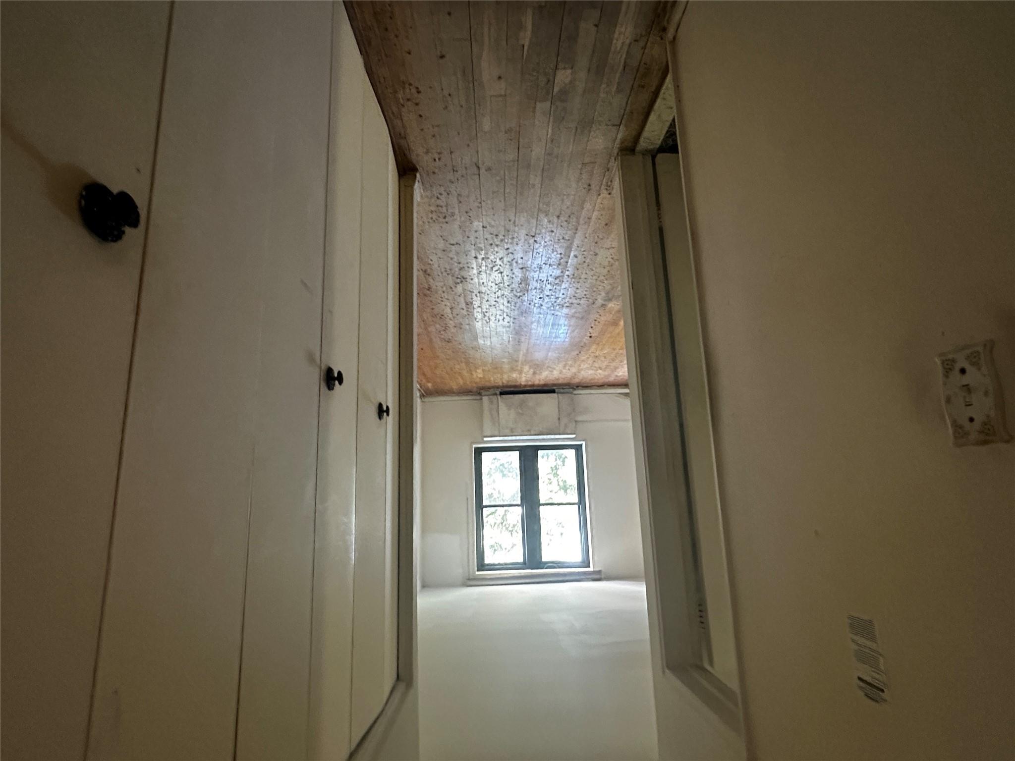 18-75 Corporal Kennedy Street, Unit 4A Queens, NY 11360 - Photo 12 of 25 Hallway with hardwood / wood-style floors