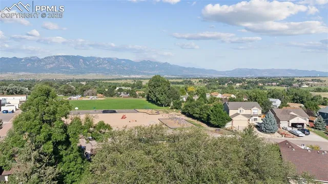 a view of a city with mountain