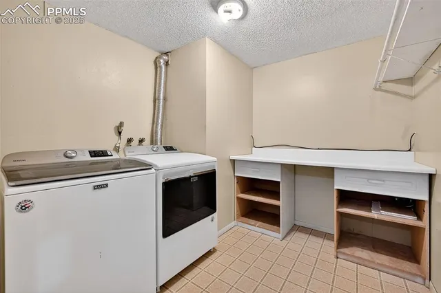 a view of a backyard with table and chairs potted plants and palm tree
