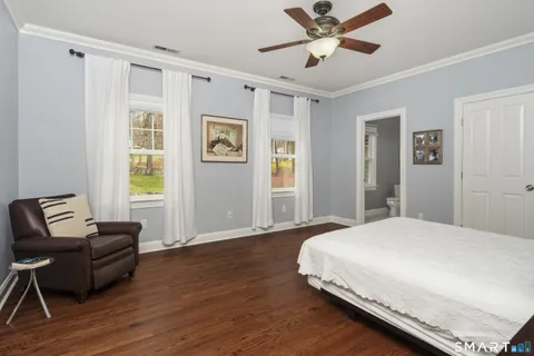 a bed room with a bed and a window