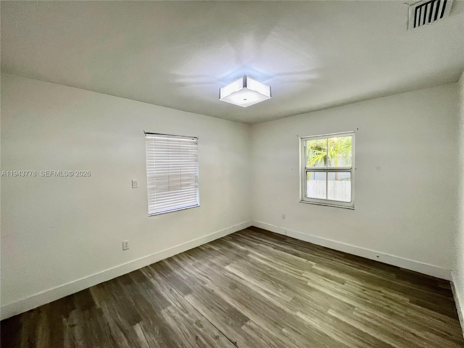 5430 Southwest 7th Street Miami, FL 33134 - Photo 11 of 16 a view of an empty room with a window
