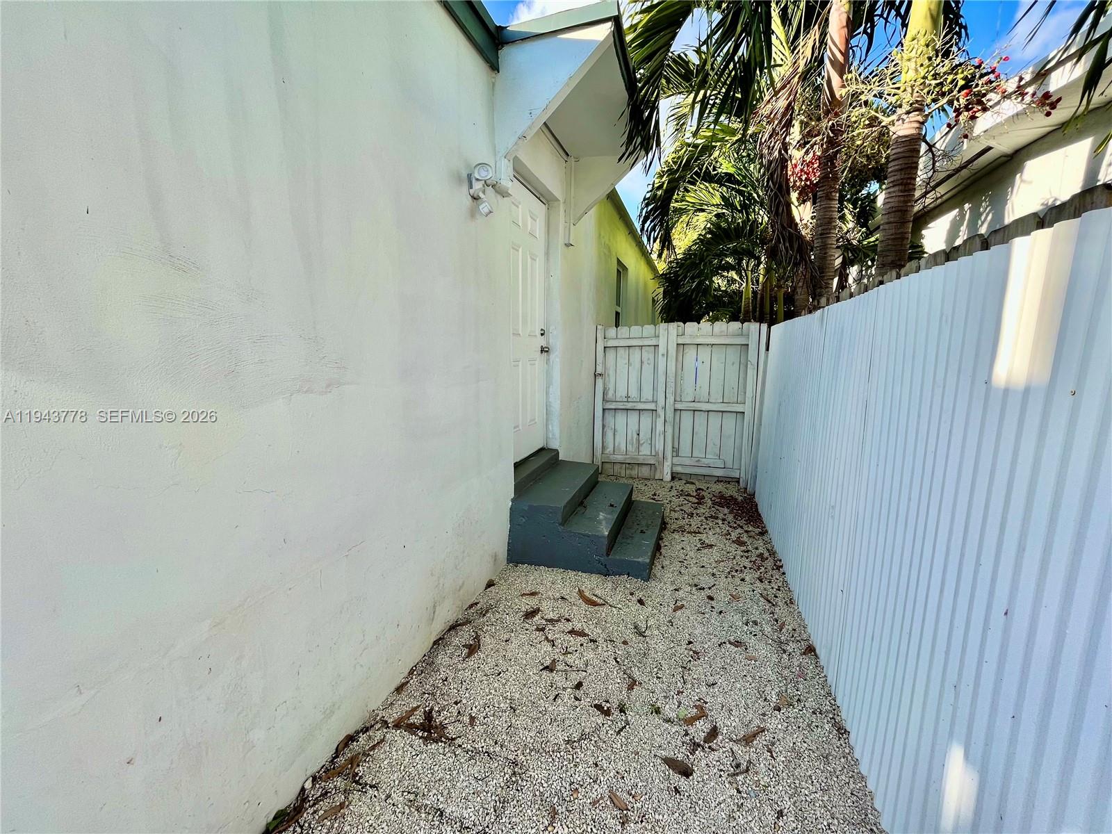 5430 Southwest 7th Street Miami, FL 33134 - Photo 13 of 16 a view of a backyard with a large tree