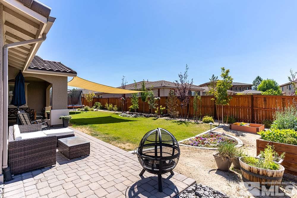 9825 Copenhagen Way Reno, NV 89521 - Photo 22 of 35 a view of a backyard with furniture and a tub