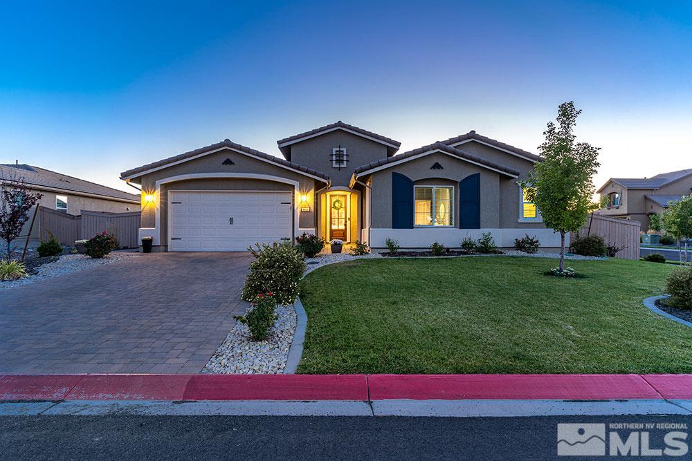 9825 Copenhagen Way Reno, NV 89521 - Photo 28 of 35 a front view of a house with a garden and yard