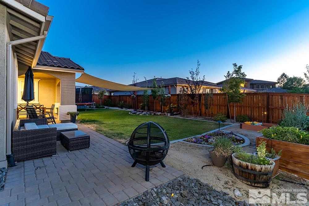 9825 Copenhagen Way Reno, NV 89521 - Photo 33 of 35 a view of a garden with patio