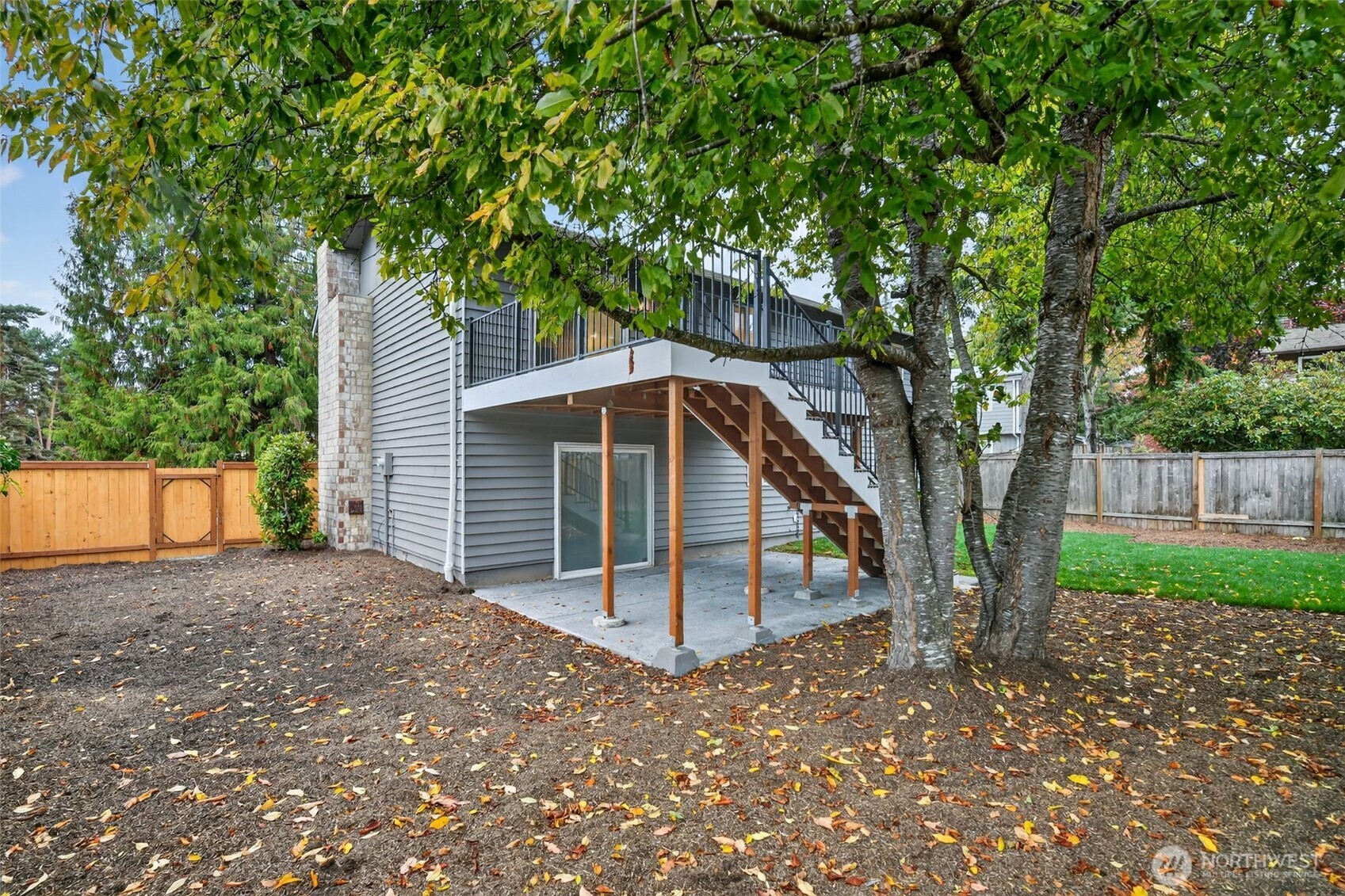 17203 Brook Boulevard Bothell, WA 98012 - Photo 29 of 31 a view of backyard with a barn and large trees