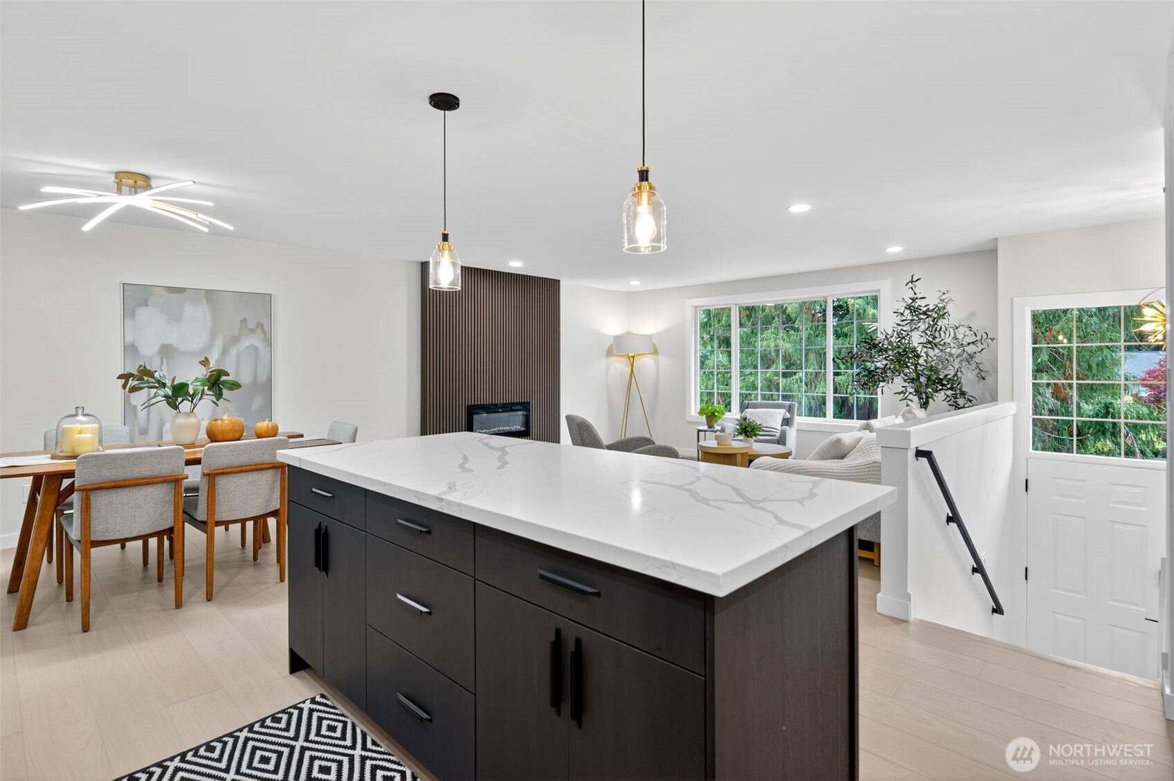 17203 Brook Boulevard Bothell, WA 98012 - Photo 8 of 31 a room with a table chairs and a view of kitchen
