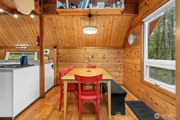 a view of a balcony with chairs