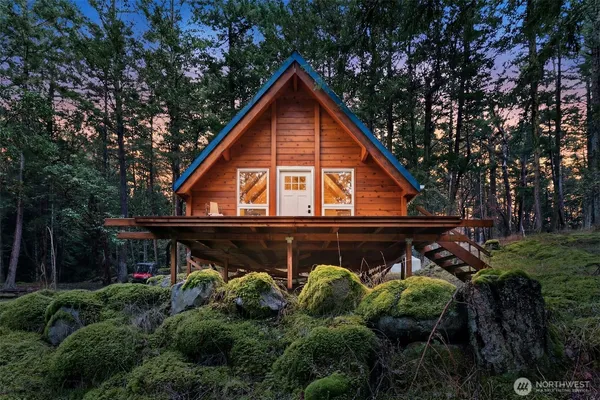 a view of house with a small yard