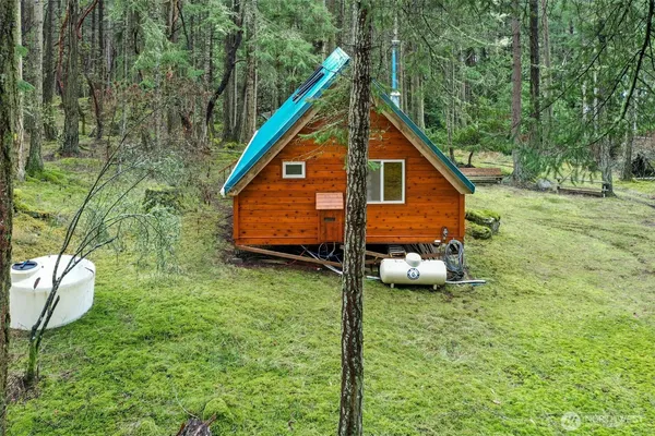 a backyard of a house with lots of green space
