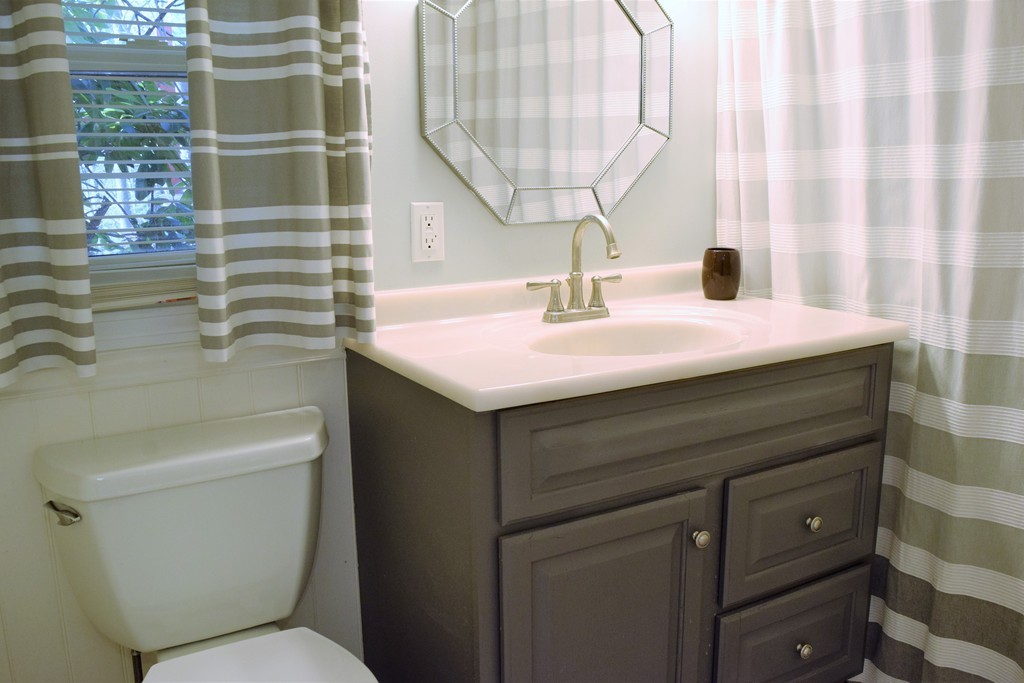 110 Horton Road Orange, MA 01364 - Photo 7 of 30 a bathroom with a sink and a mirror