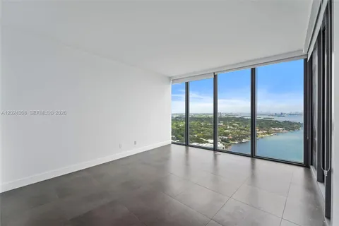 a view of an empty room and window