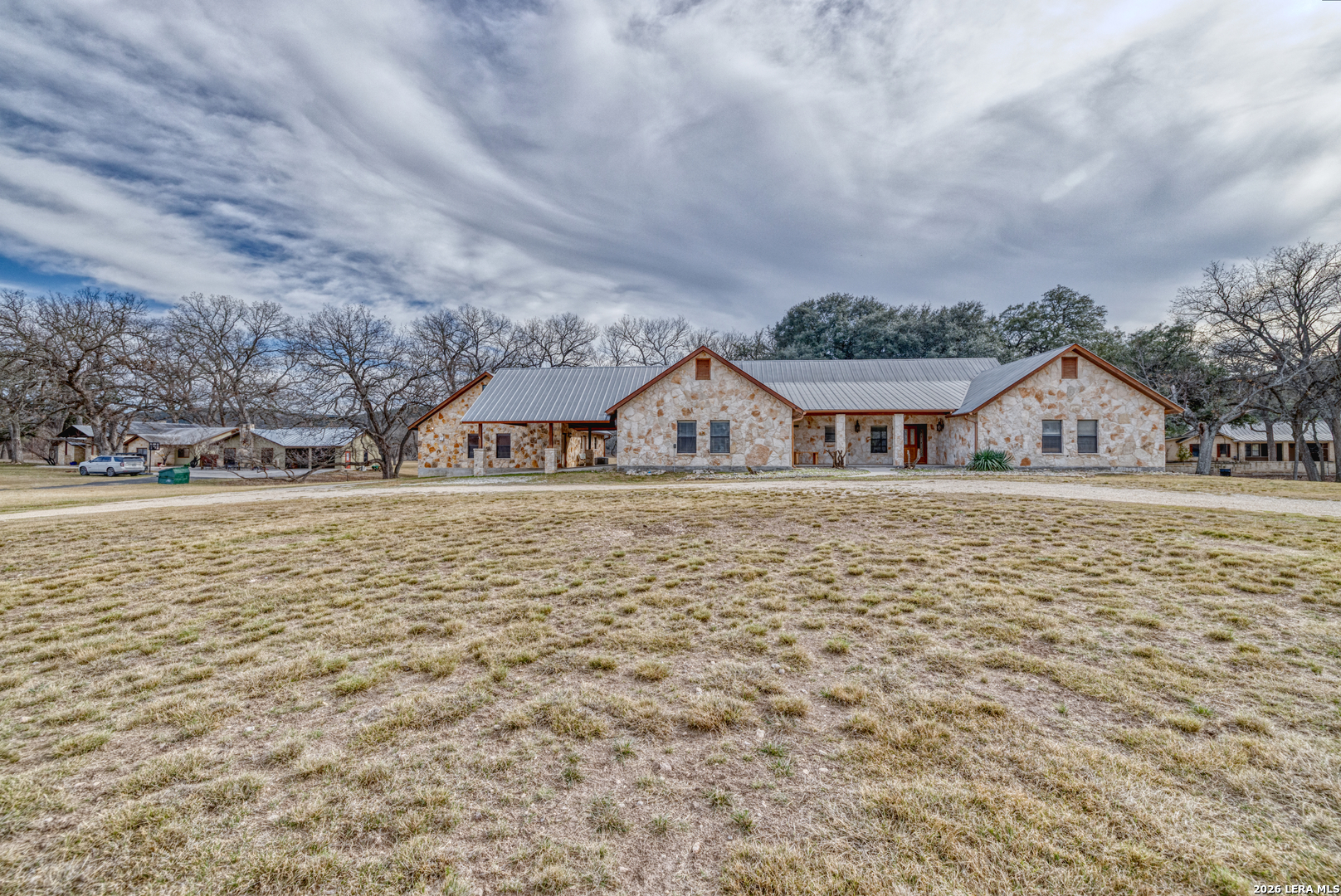 498 Camino Del Rancho Concan, TX 78838 - Photo 2 of 49 a view of house with garden space