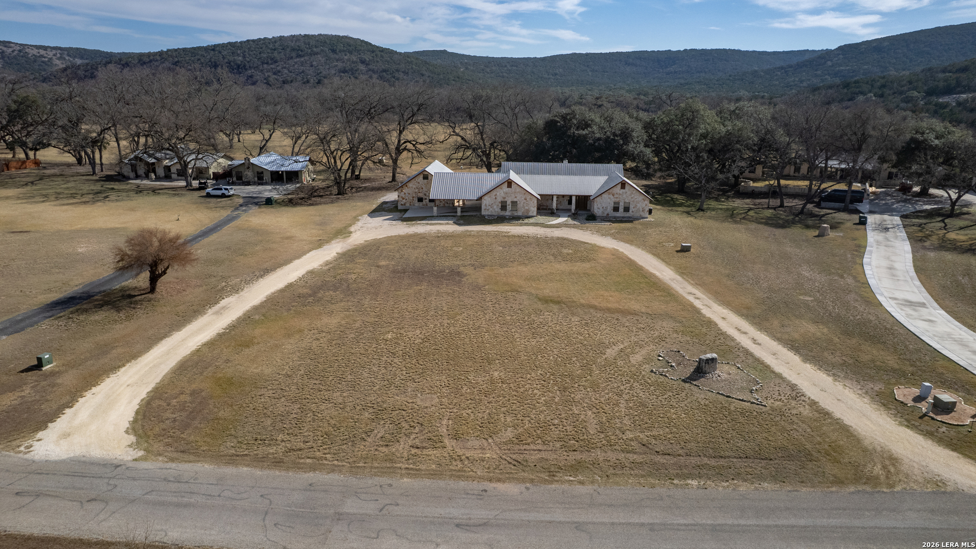 498 Camino Del Rancho Concan, TX 78838 - Photo 4 of 49 a view of a terrace with a yard