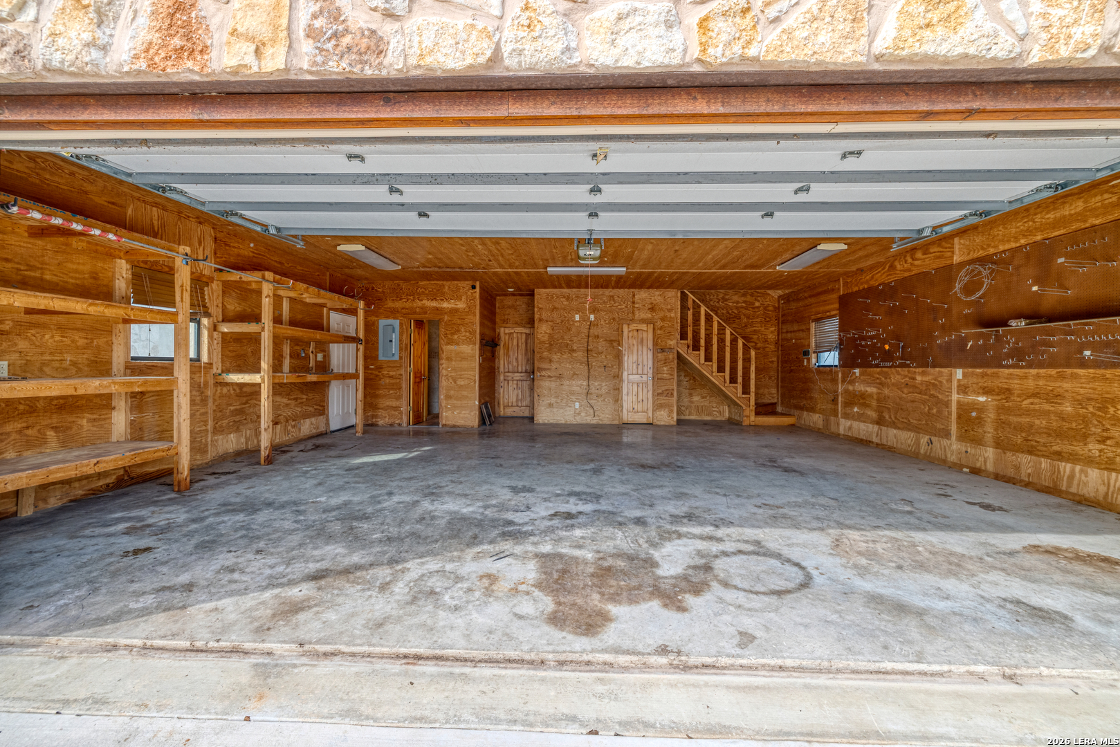 498 Camino Del Rancho Concan, TX 78838 - Photo 41 of 49 a view of a room with wooden walls