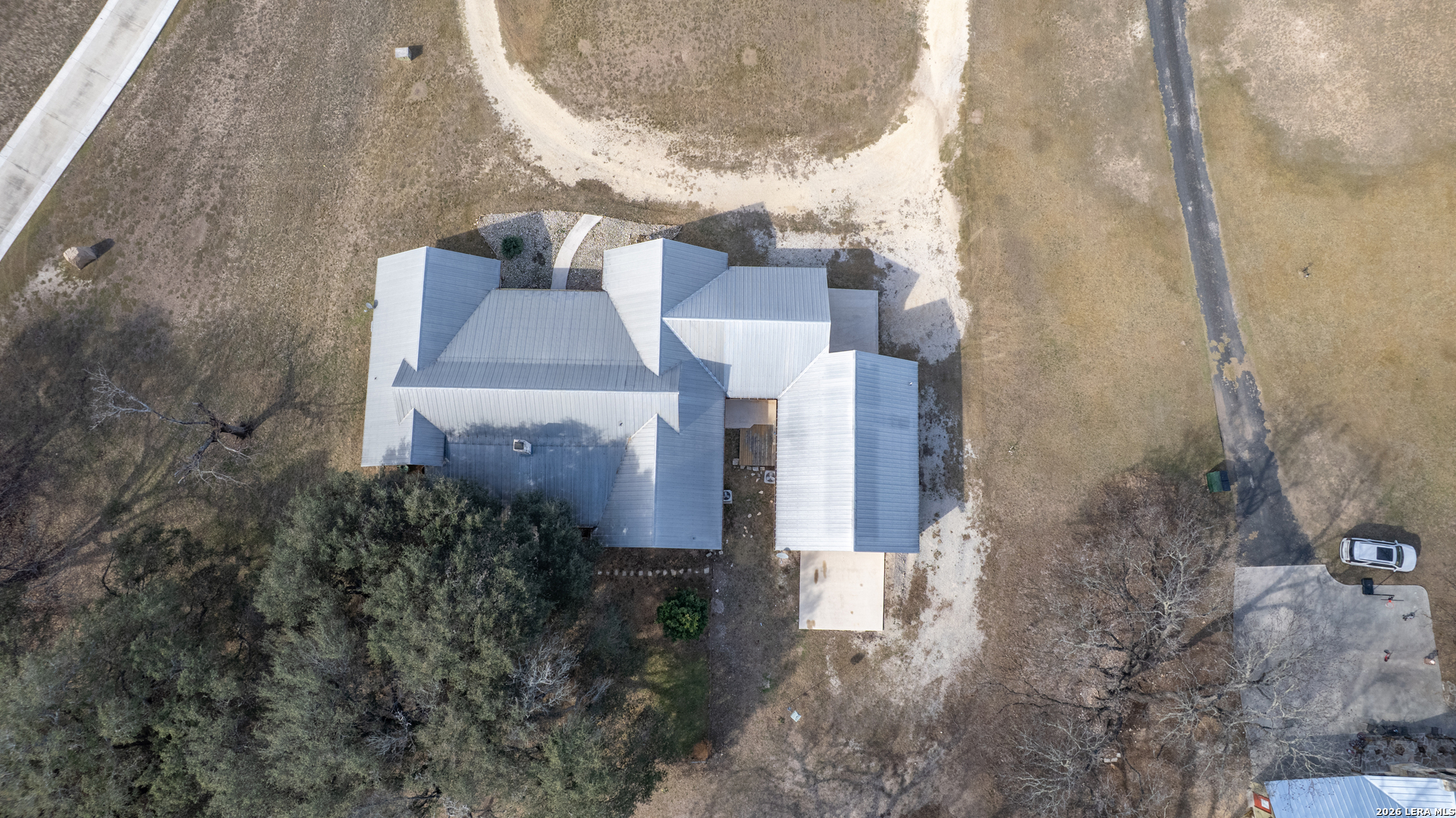 498 Camino Del Rancho Concan, TX 78838 - Photo 6 of 49 a view of a house with a yard