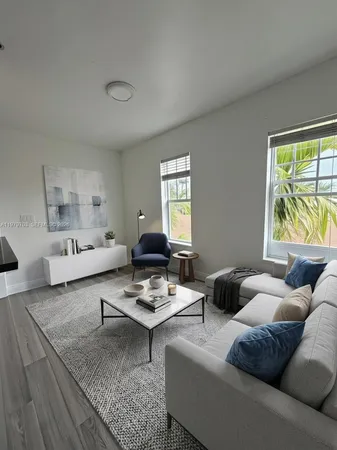 a living room with furniture and a couch