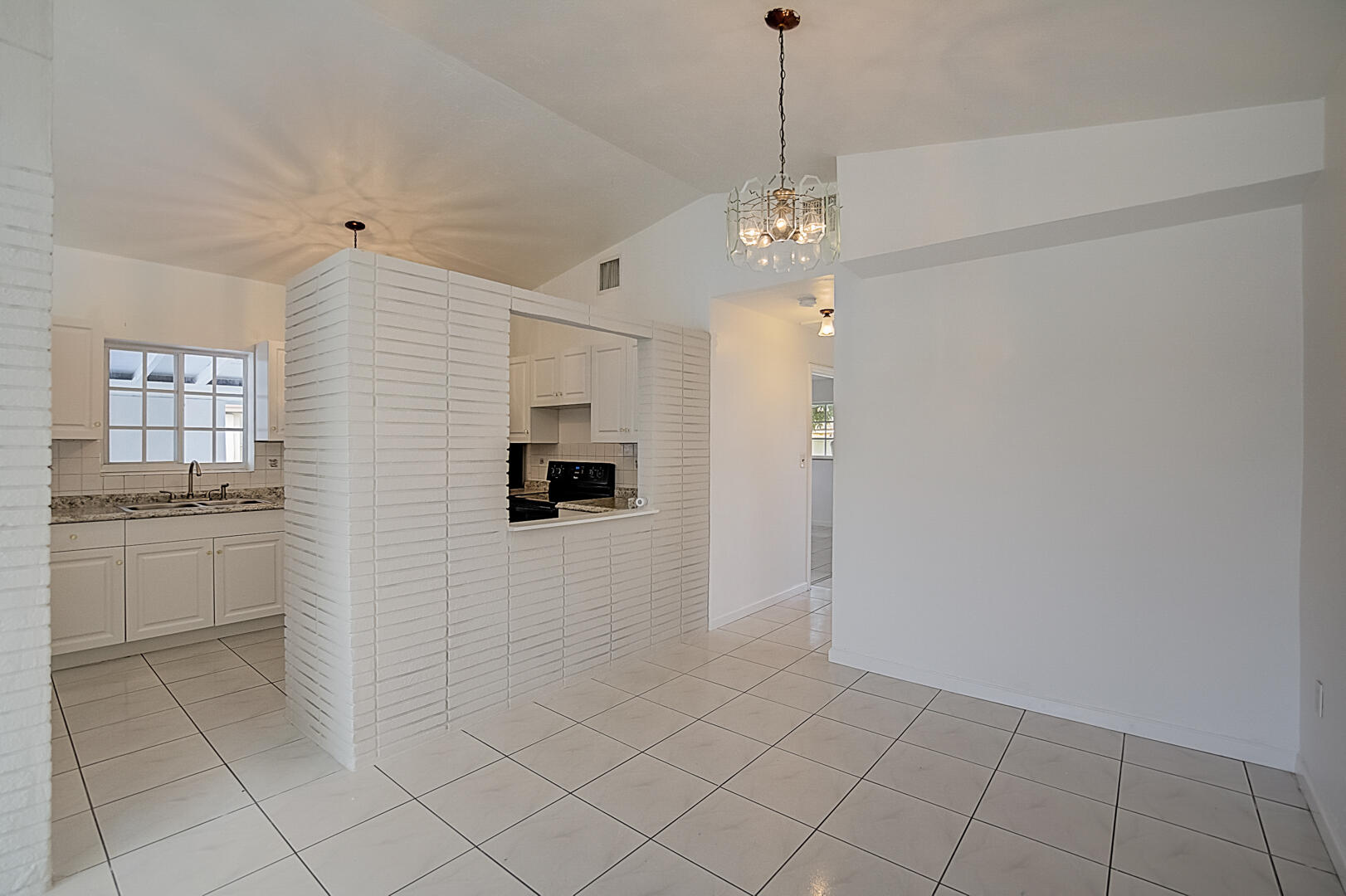 2813 Southwest 68th Terrace Miramar, FL 33023 - Photo 11 of 29 a view of a livingroom with a kitchen