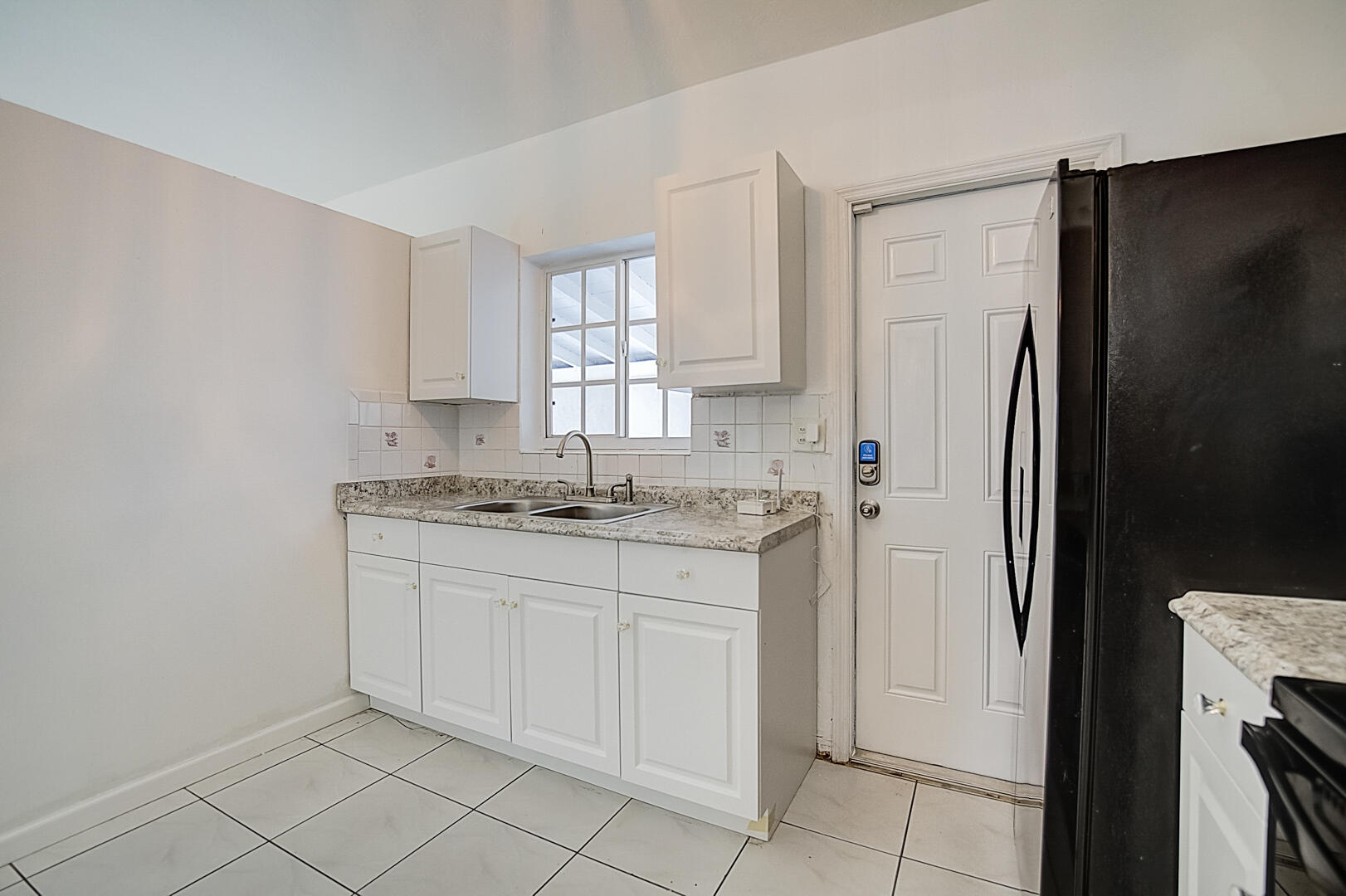 2813 Southwest 68th Terrace Miramar, FL 33023 - Photo 14 of 29 a bathroom with a sink and a mirror