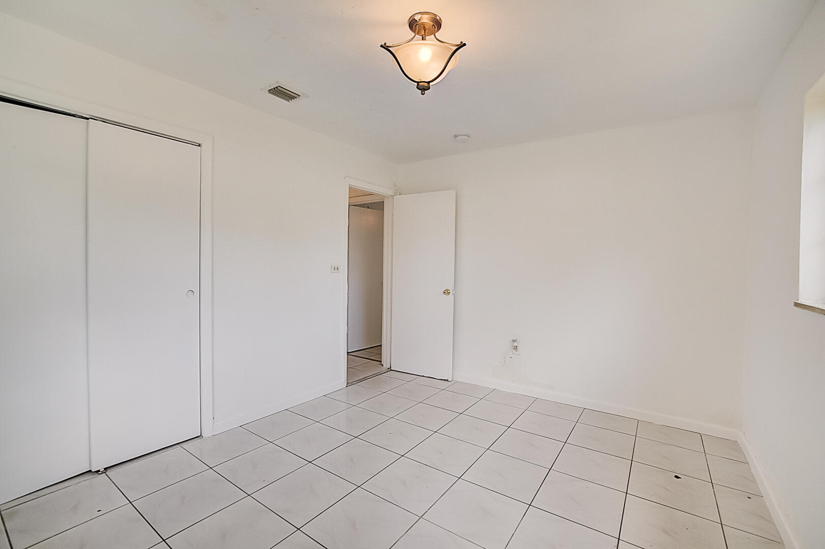 2813 Southwest 68th Terrace Miramar, FL 33023 - Photo 19 of 29 a view of an empty room