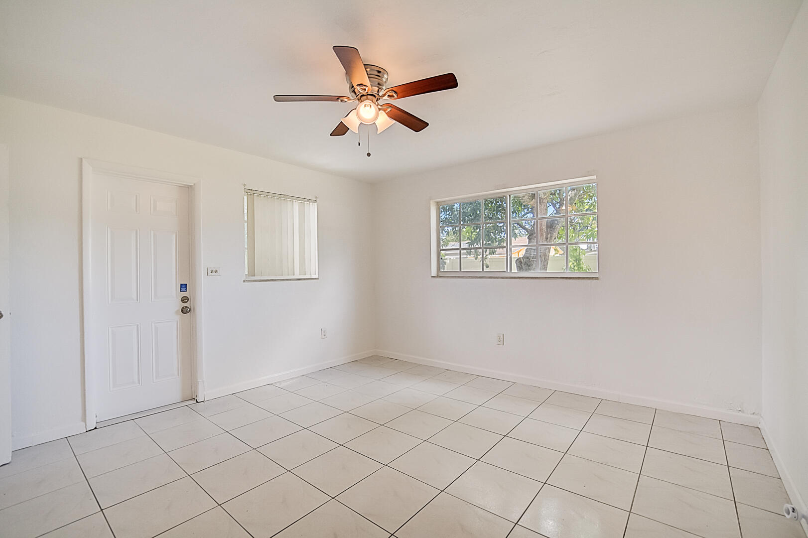 2813 Southwest 68th Terrace Miramar, FL 33023 - Photo 20 of 29 a view of an empty room with a window