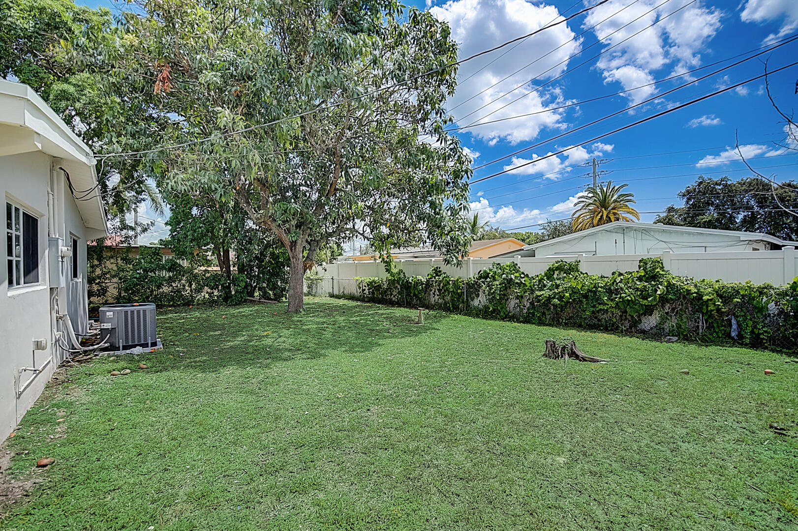 2813 Southwest 68th Terrace Miramar, FL 33023 - Photo 24 of 29 a view of a backyard with a garden
