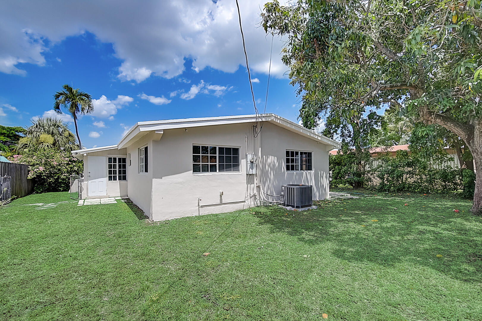 2813 Southwest 68th Terrace Miramar, FL 33023 - Photo 26 of 29 a view of a house with a yard