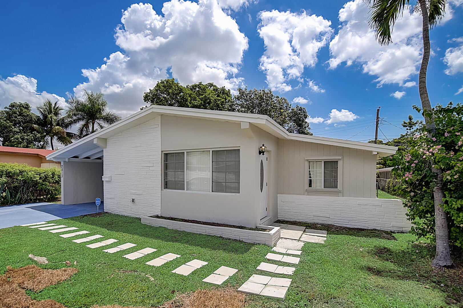 2813 Southwest 68th Terrace Miramar, FL 33023 - Photo 28 of 29 a view of a house with a yard
