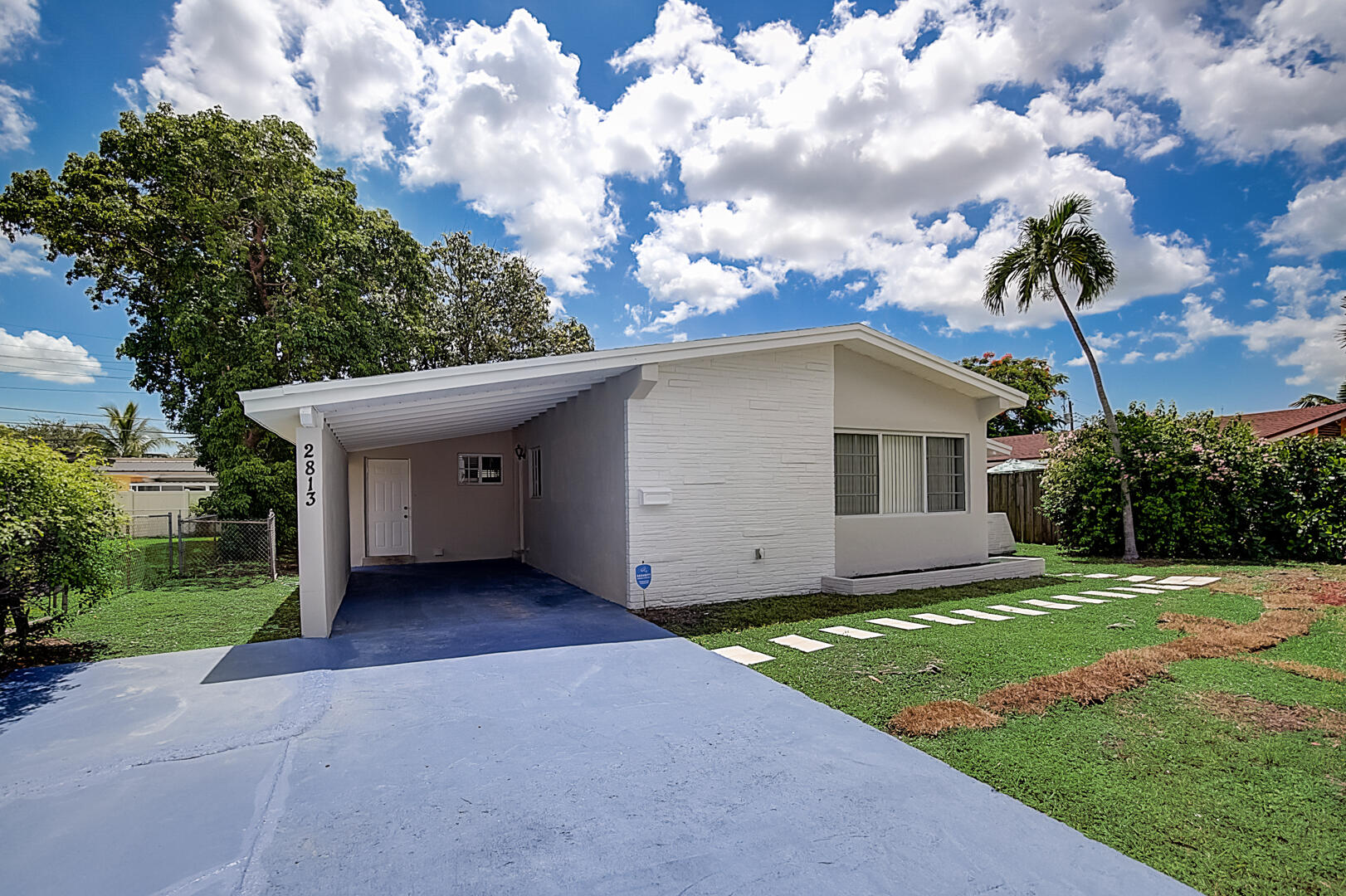2813 Southwest 68th Terrace Miramar, FL 33023 - Photo 29 of 29 a view of a house with a yard