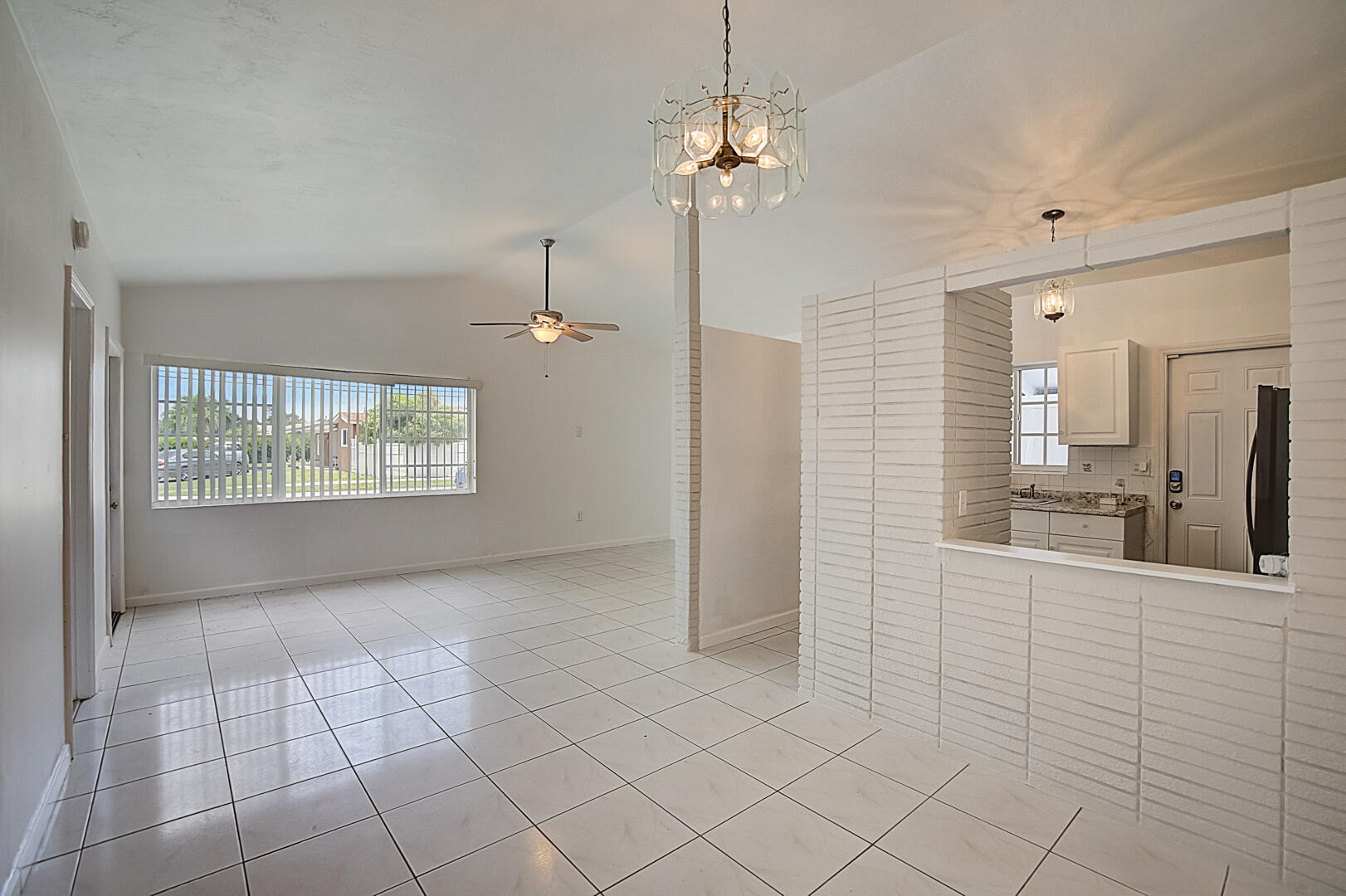 2813 Southwest 68th Terrace Miramar, FL 33023 - Photo 5 of 29 a view of a hallway with chandelier and chandelier