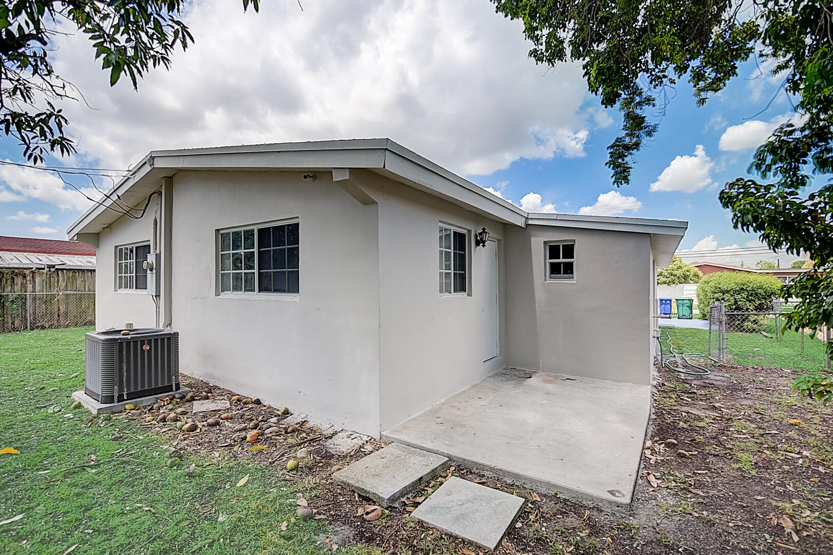 2813 Southwest 68th Terrace Miramar, FL 33023 - Photo 7 of 29 a front view of a house with a yard