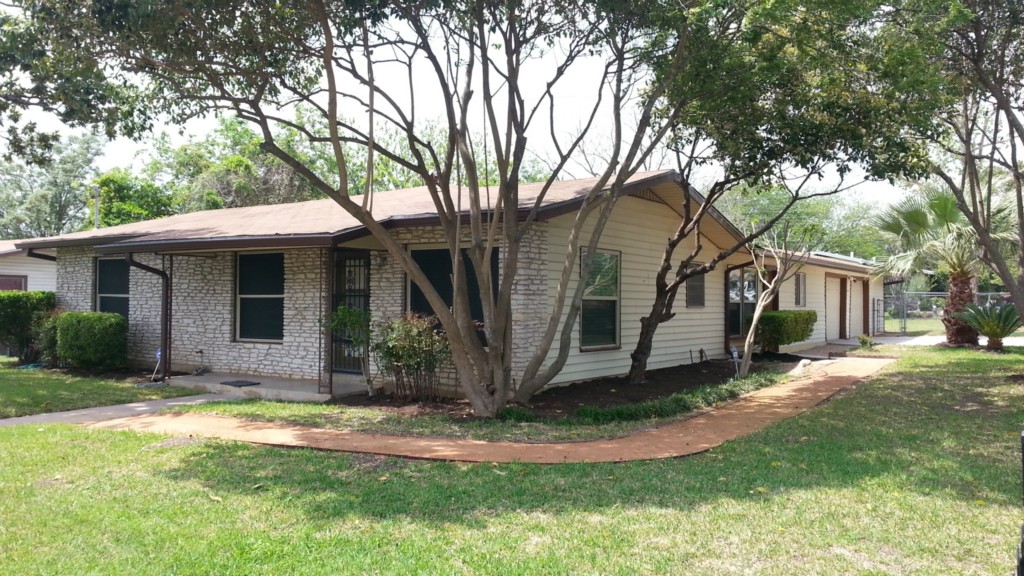 1604 Springdale Road Austin, TX 78721 - Photo 1 of 1 a view of a house with a yard