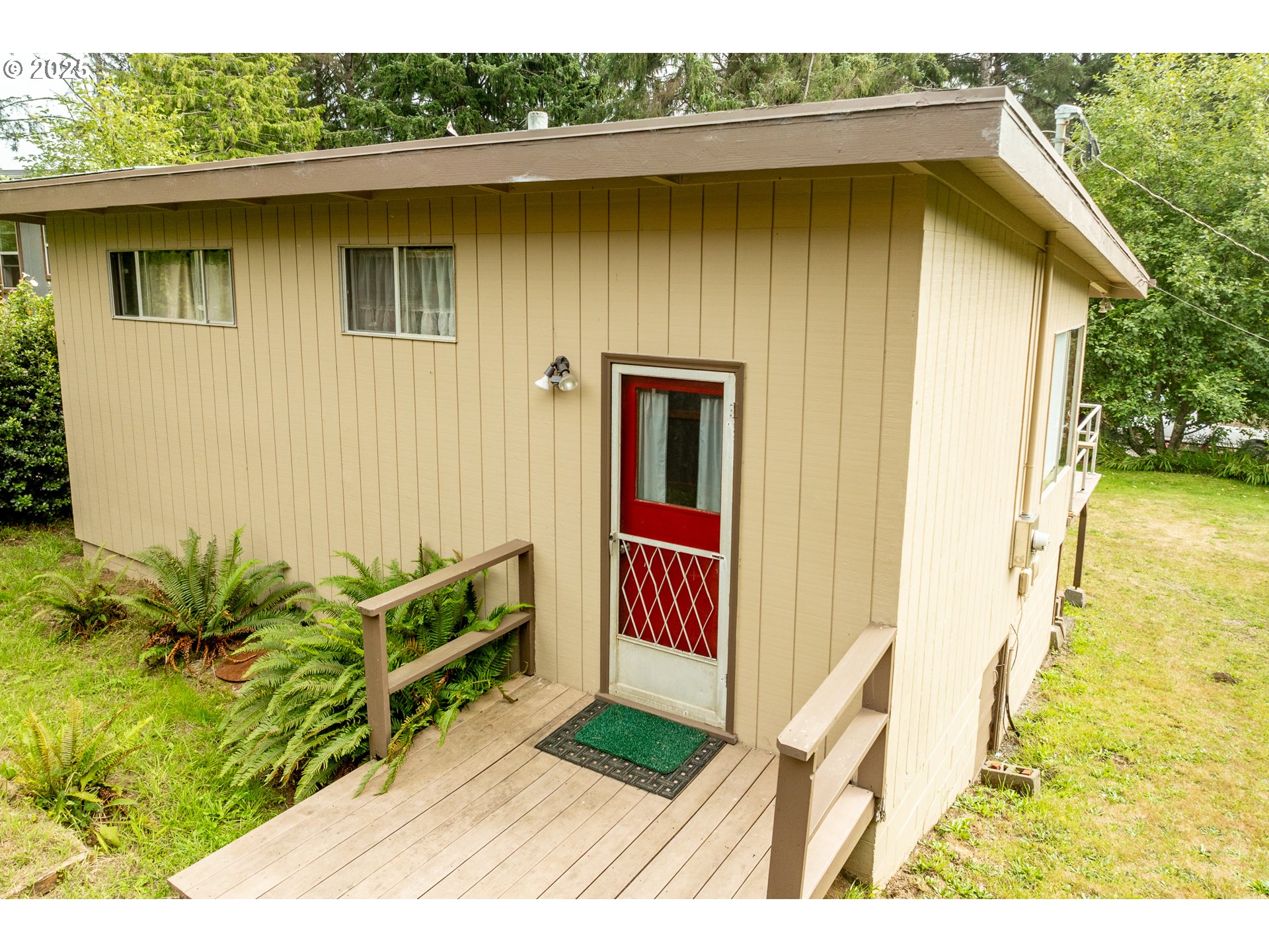 37365 4th Street Nehalem, OR 97131 - Photo 1 of 27 a view of outdoor space and yard