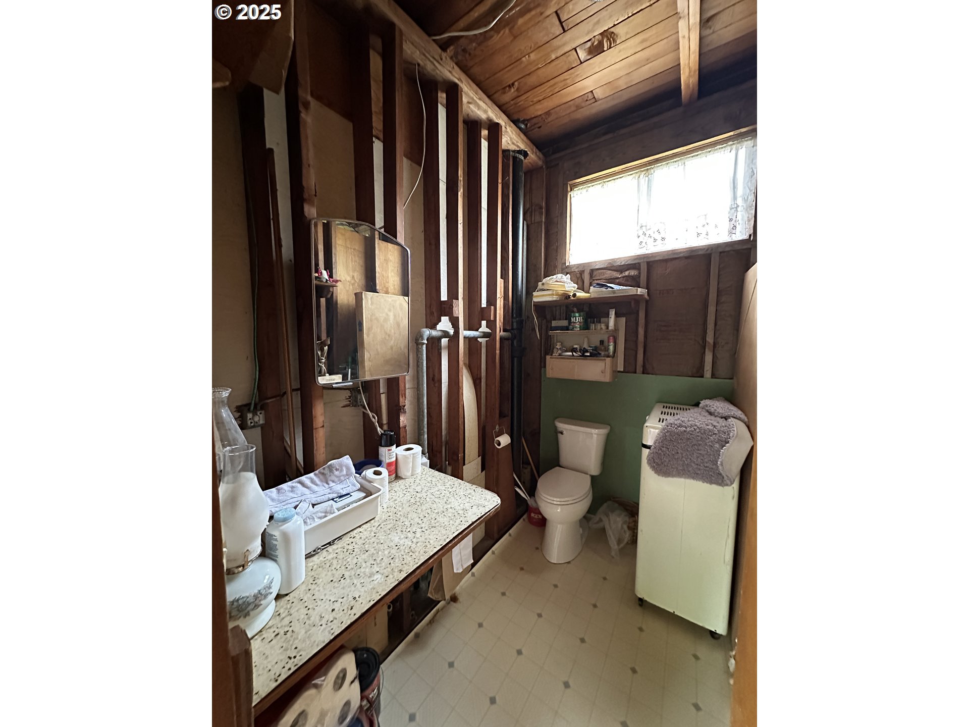 37365 4th Street Nehalem, OR 97131 - Photo 13 of 27 a dining room with furniture and window