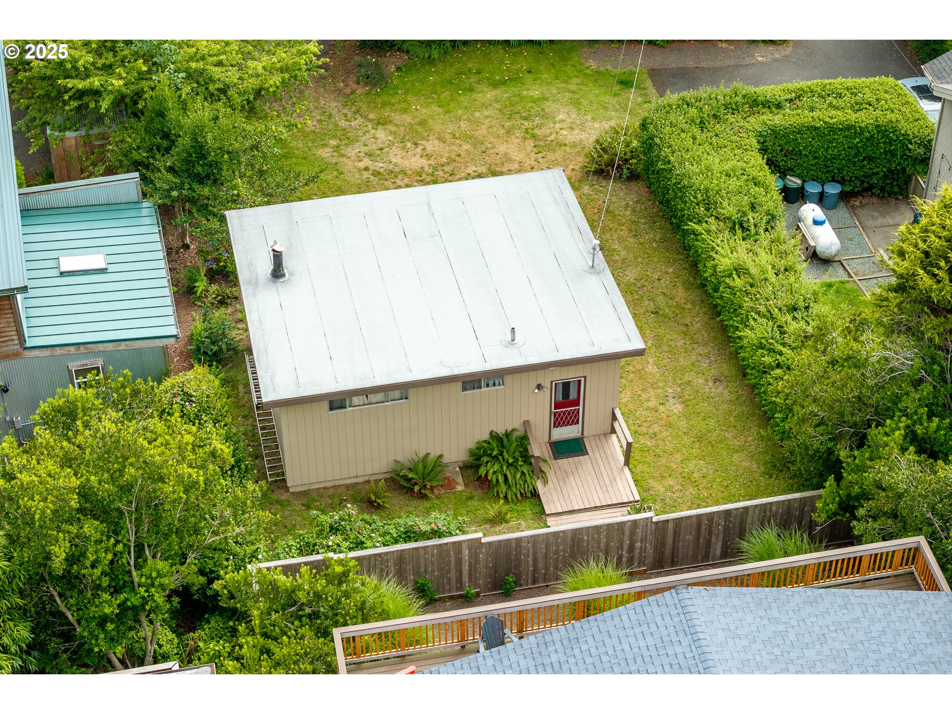 37365 4th Street Nehalem, OR 97131 - Photo 15 of 27 a view of a back yard from a balcony
