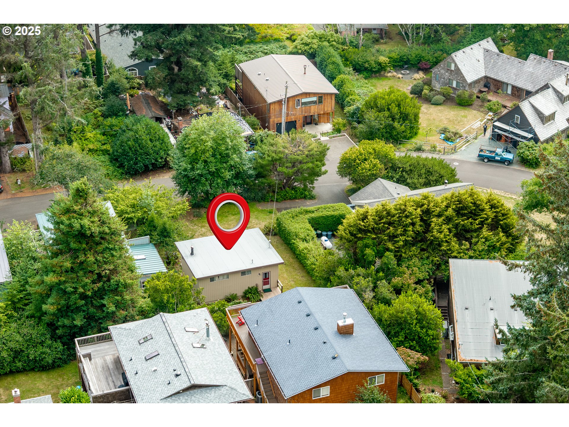 37365 4th Street Nehalem, OR 97131 - Photo 22 of 27 an aerial view of residential house with outdoor space and street view